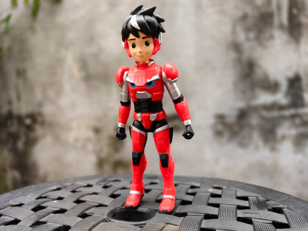 Here, the skin tone of the figure comes off as redder than it is. 